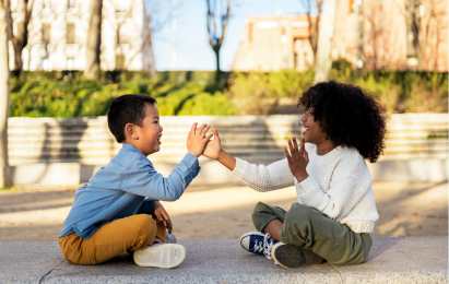 child and woman playing